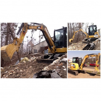 Планировка земли мини-экскаватором Caterpillar 305